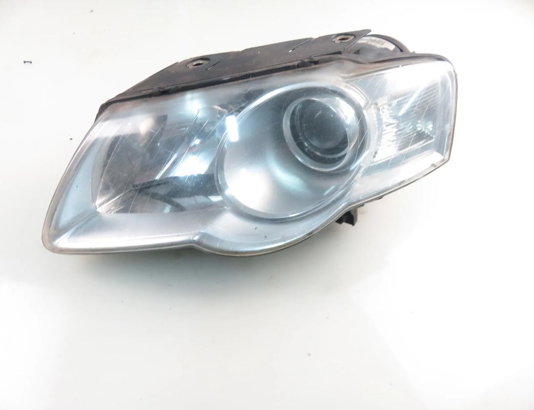 VOLKSWAGEN Passat B6 (2005-2010) Фара передняя левая 89312179 29361422