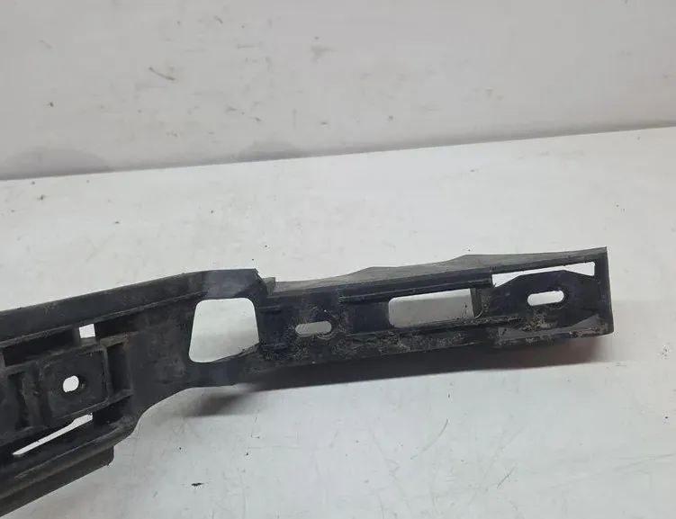 VOLKSWAGEN Touran 1 generation (2003-2015) Левый держатель заднего бампера 1T0807375 33402917