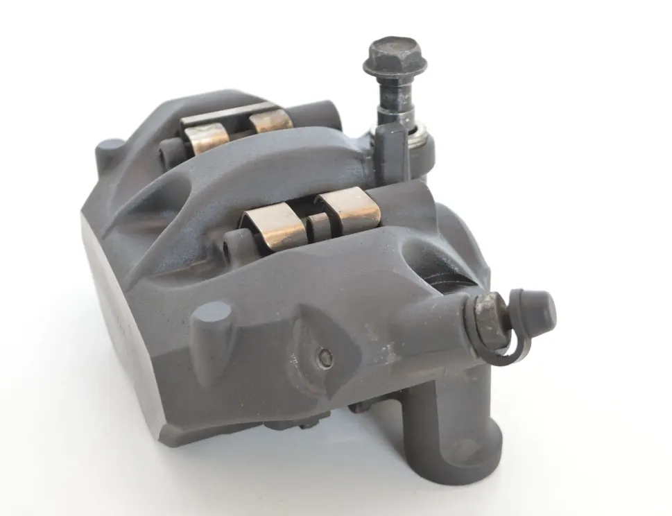 KAWASAKI NINJA Priekšējais kreisās puses bremžu suports 11595067