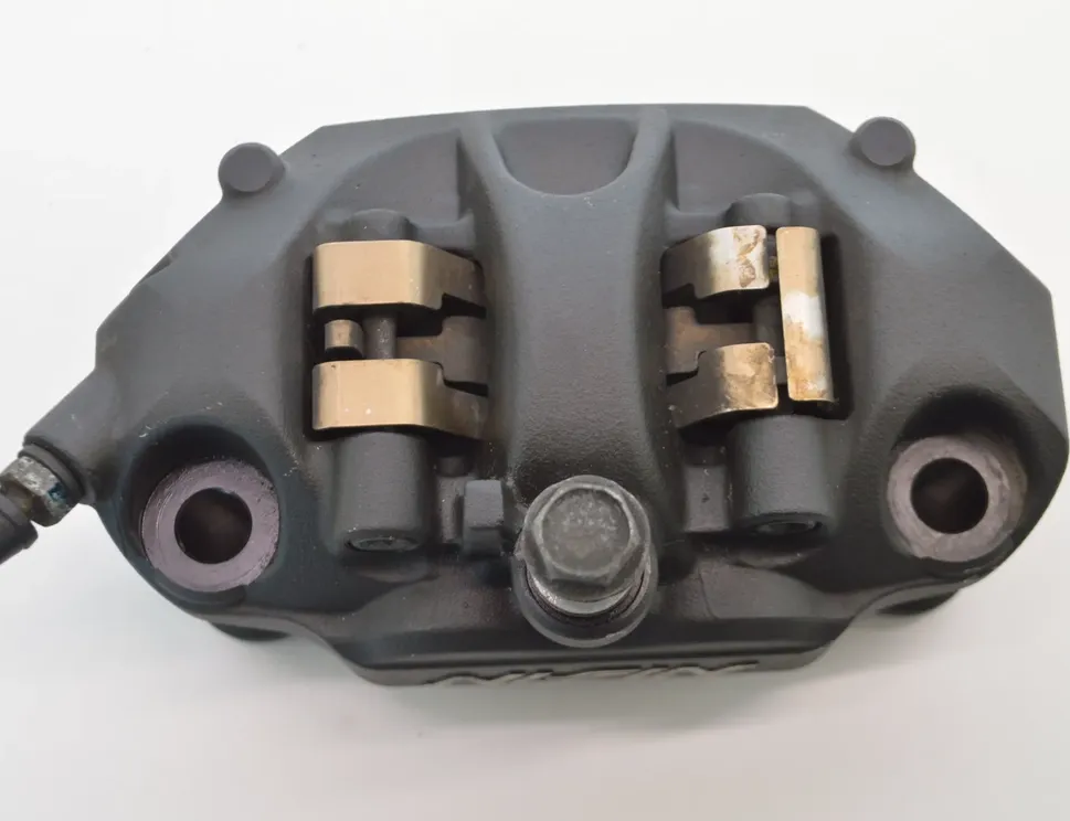 KAWASAKI NINJA Priekšējais kreisās puses bremžu suports 11595067