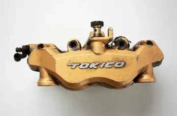 KAWASAKI NINJA Priekšējais kreisās puses bremžu suports 2832273